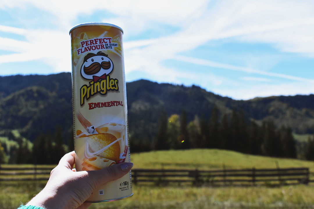 Kellogg is vooral bekend van ontbijtgranen, maar maakt ook chips onder het merk Pringles. - Foto: Canva/Dids